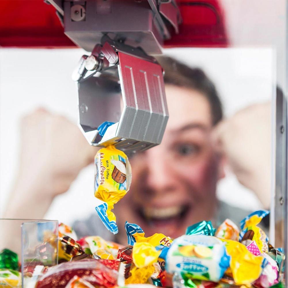 Дозатор цукерок Grab Candy або іграшковий автомат для захоплення солодощів або цукерок